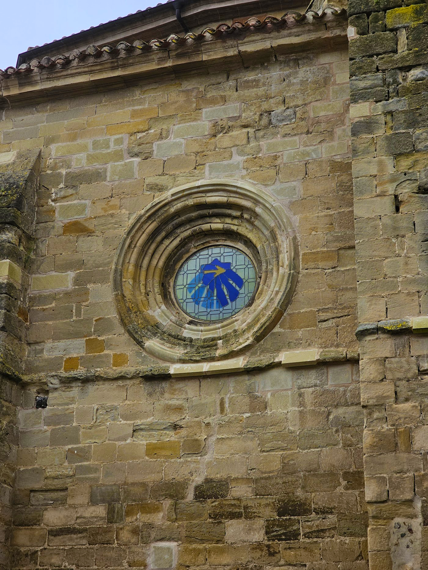 A stained-glass Camino shell window